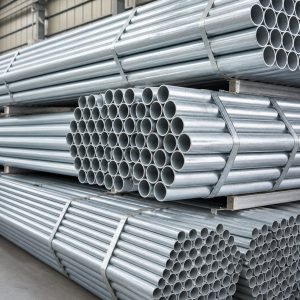 Pre-galvanized steel pipe BS 1387 medium and heavy series stacked in bundles at the factory